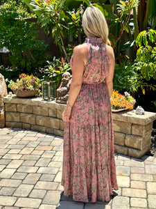 You will receive endless compliments in this timeless sleeveless beautiful boho dress.  It's perfect for spring, summer or warm fall days .  It's lightweight, colorful, fun with a ruffled v-neckline and ruffled skirt. Multi-color paisley print in salmon pink, sage green, bronze and light pink. Made by Karma Highway.  ONE SIZE FITS MOST.