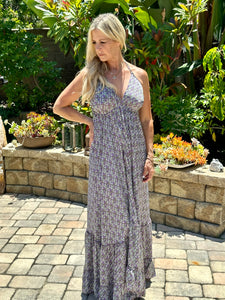 One of our top selling dresses is back!  You will receive endless compliments in this timeless beautiful boho dress.  It's perfect for spring, summer or warm fall days .  It's lightweight, colorful, fun and sexy with a plunge neckline and open back. Multi-color paisley print in purple, olive green and celadon green. Made by Karma Highway.  ONE SIZE FITS MOST.